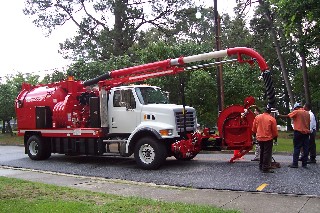 The Fairmont Public Works Department tests out the town's brand new sewer flusher truck.